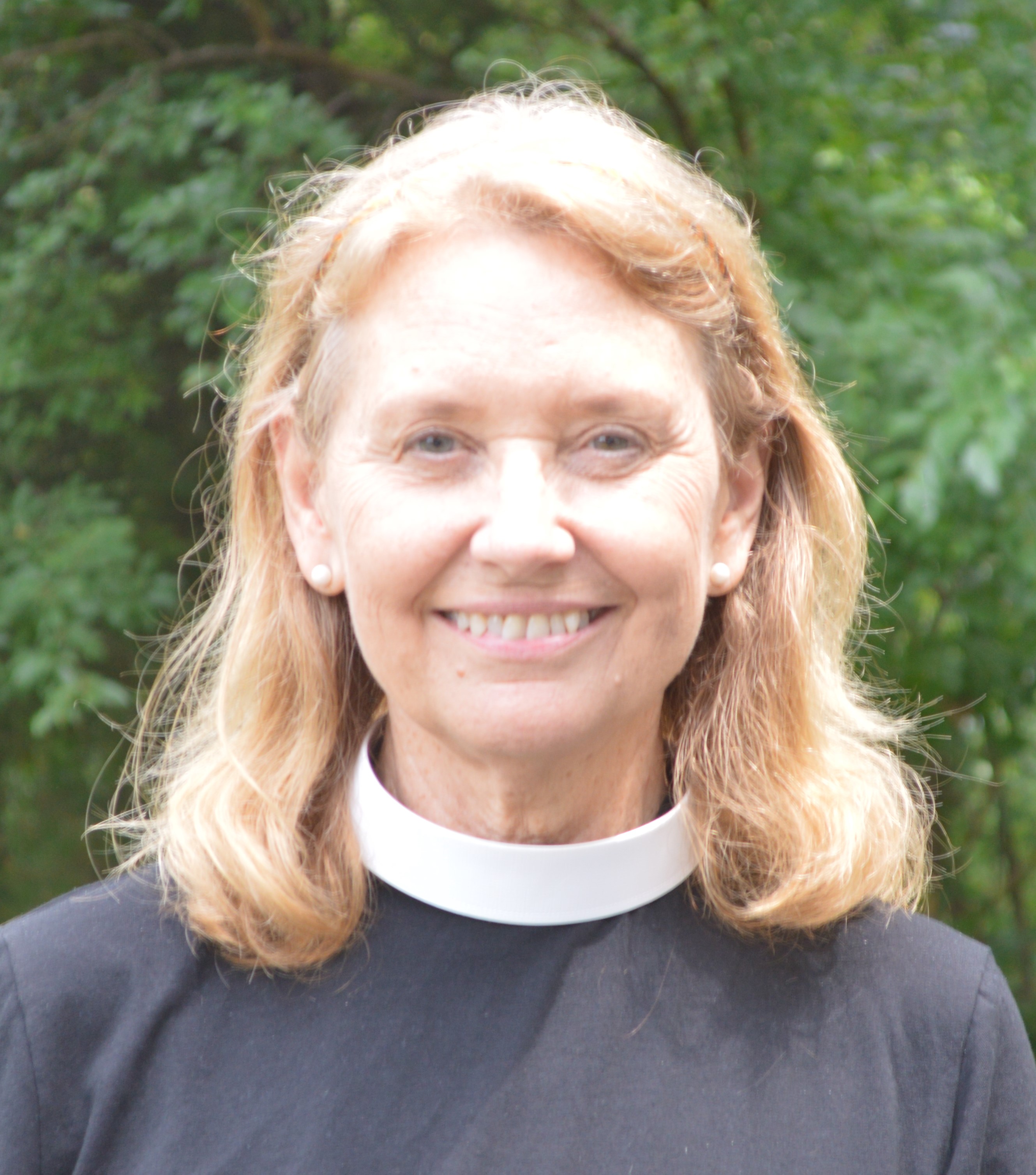 The Rev. Martha Clark The Rev. Martha Clark